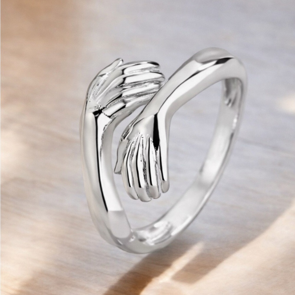 Elegant Silver Hands Embrace Ring